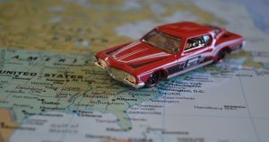 Red Hot Wheel car on a map of North America