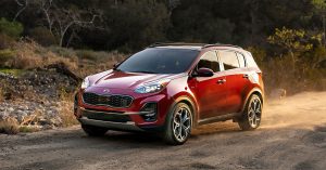Red 2020 Kia Sportage on a dirt road